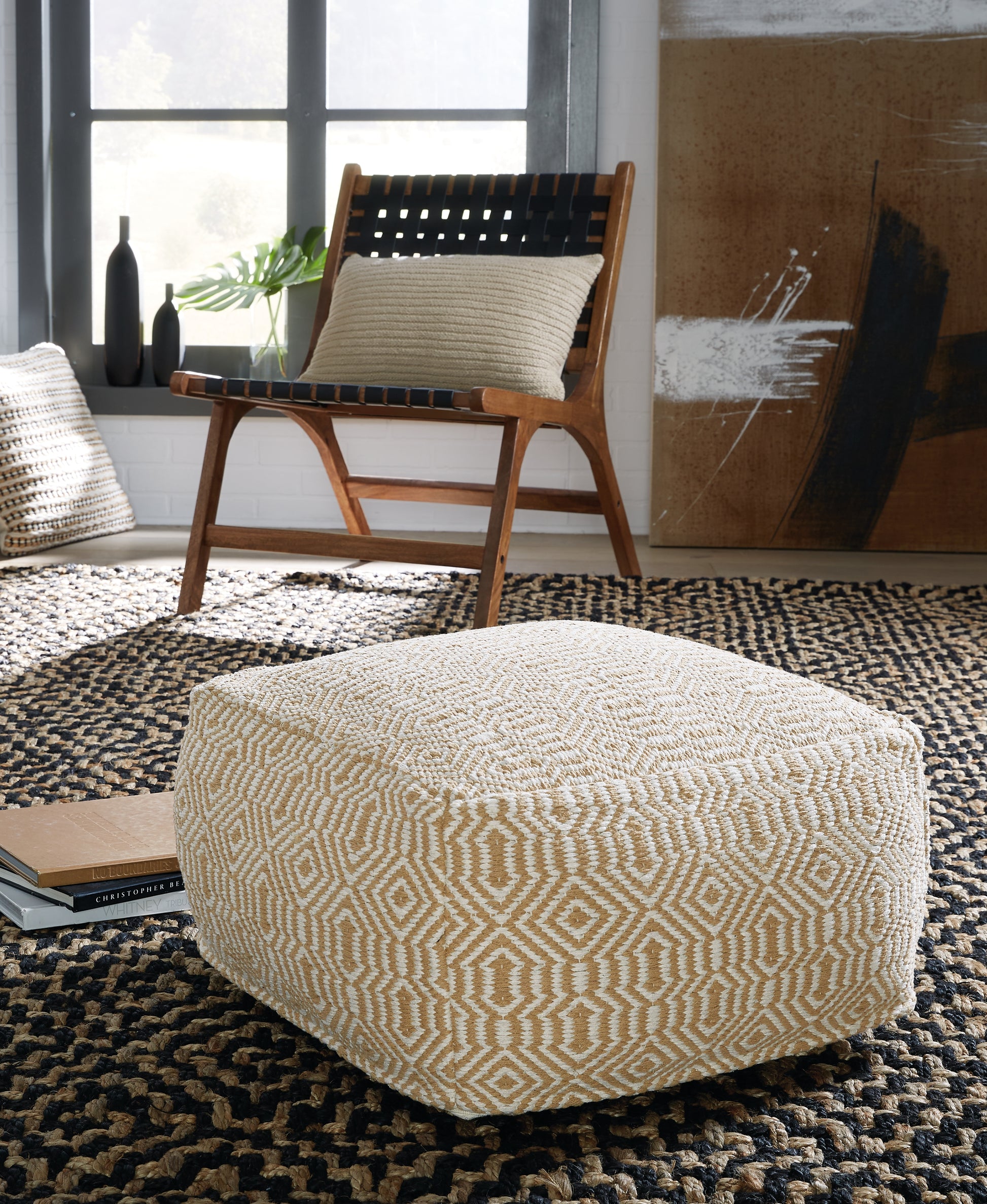 Ocala Furniture Outlet - Ashley Furniture - Adamont Pouf - Pouf / Tan/Ivory - A1001059