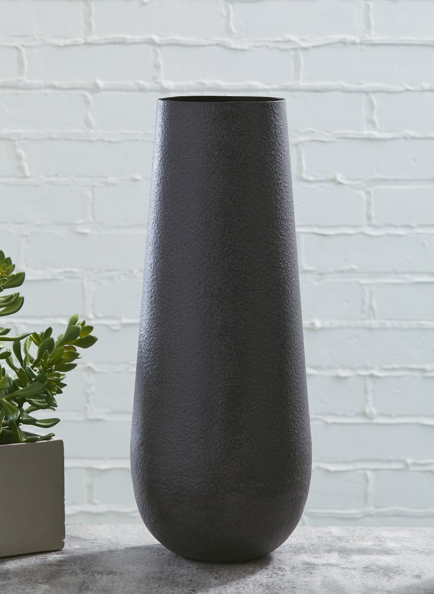 Ocala Furniture Outlet - Ashley Furniture - Fynn Vase - Vase / Antique Brown - A2000516