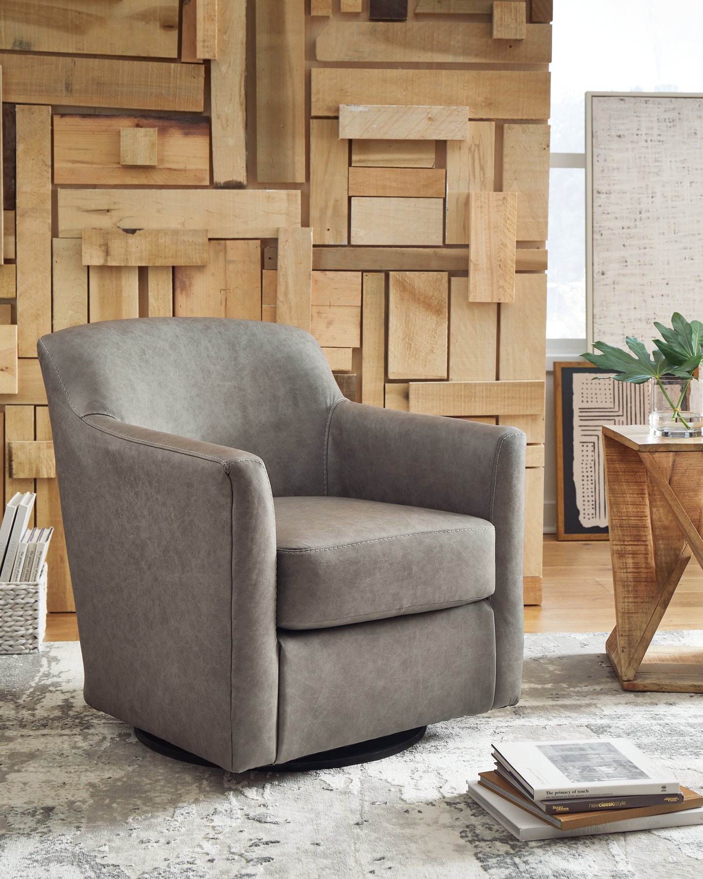 Ocala Furniture Outlet - Ashley Furniture - Bradney Swivel Accent Chair - Swivel Accent Chair / Fossil - A3000324