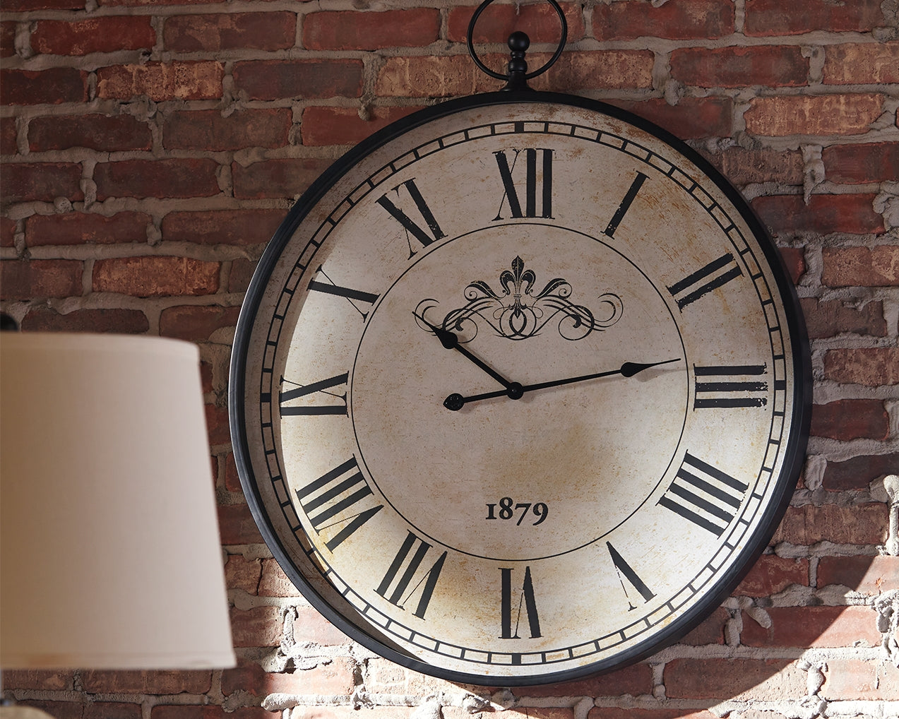 Ocala Furniture Outlet - Ashley Furniture - Augustina Wall Decor - Wall Clock / Antique Black - A8010110