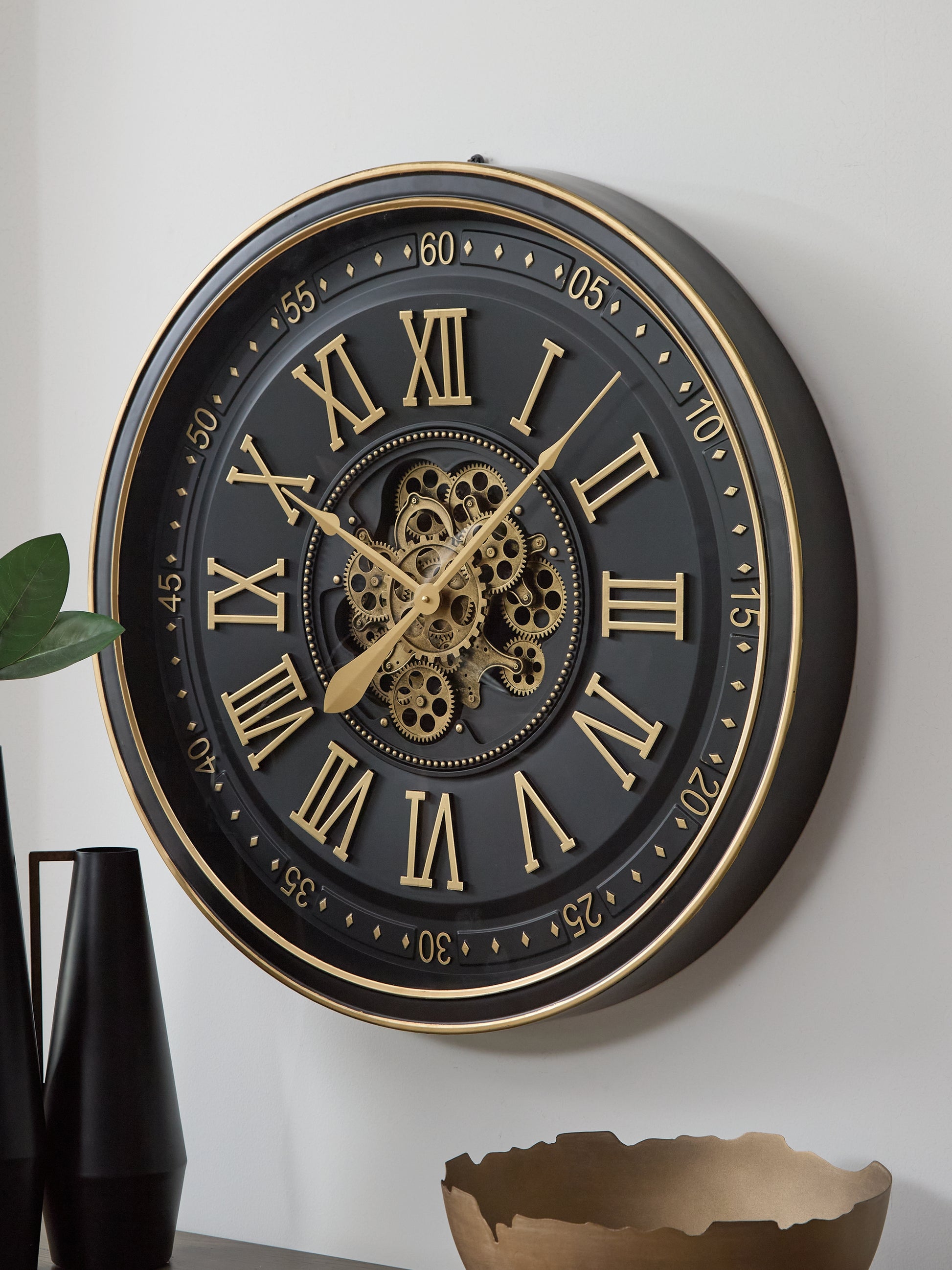 Ocala Furniture Outlet - Ashley Furniture - Dairton Wall Decor - Wall Clock / Black/Gold Finish - A8010385