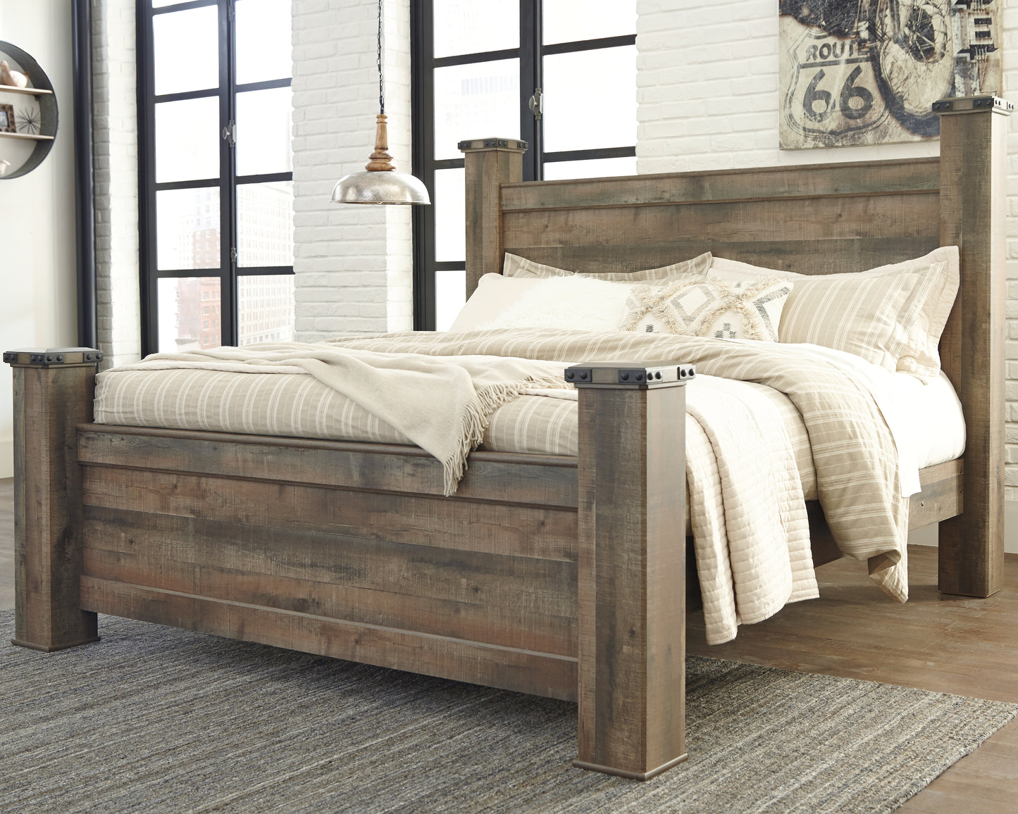 Ocala Furniture Outlet - Ashley Furniture - Trinell Bedroom - King Poster Bed / Brown - B446B45