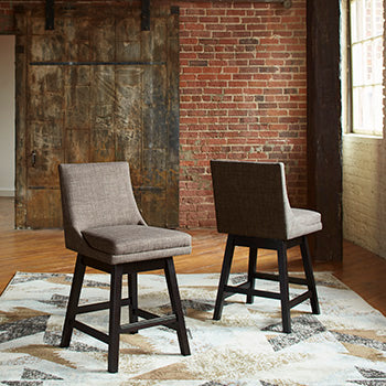 Ocala Furniture Outlet - Ashley Furniture - Tallenger Dining Room - Bar Height Bar Stool (Set of 2) / Black/Dark Brown - D380-930X2