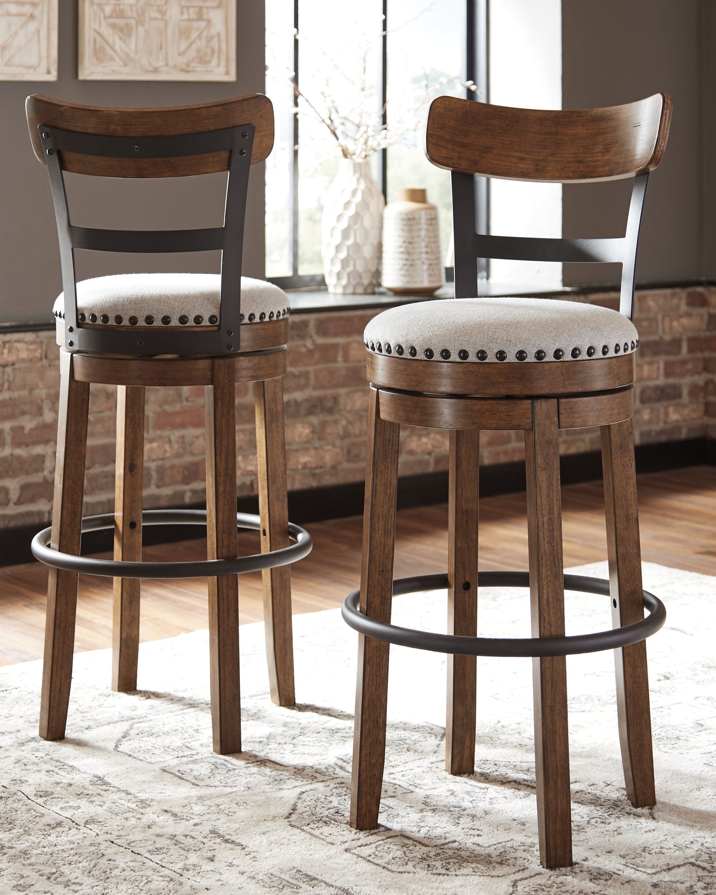 Ocala Furniture Outlet - Ashley Furniture - Valebeck Dining Room - Tall UPH Swivel Barstool(1/CN) / Brown - D546-430