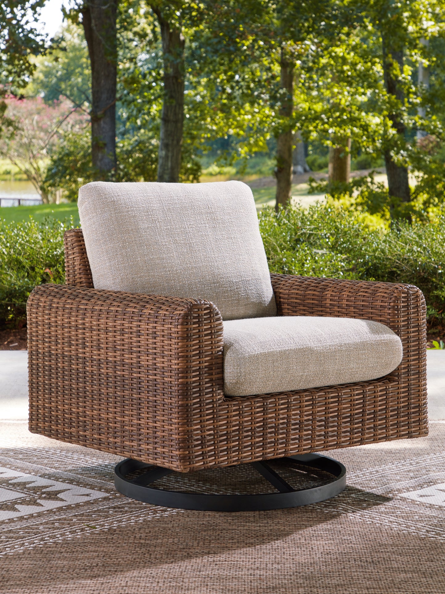 Ocala Furniture Outlet - Ashley Furniture - Dolan Creek Outdoor - Swivel Lounge w/ Cushion / Gray/Brown - PCP610-821
