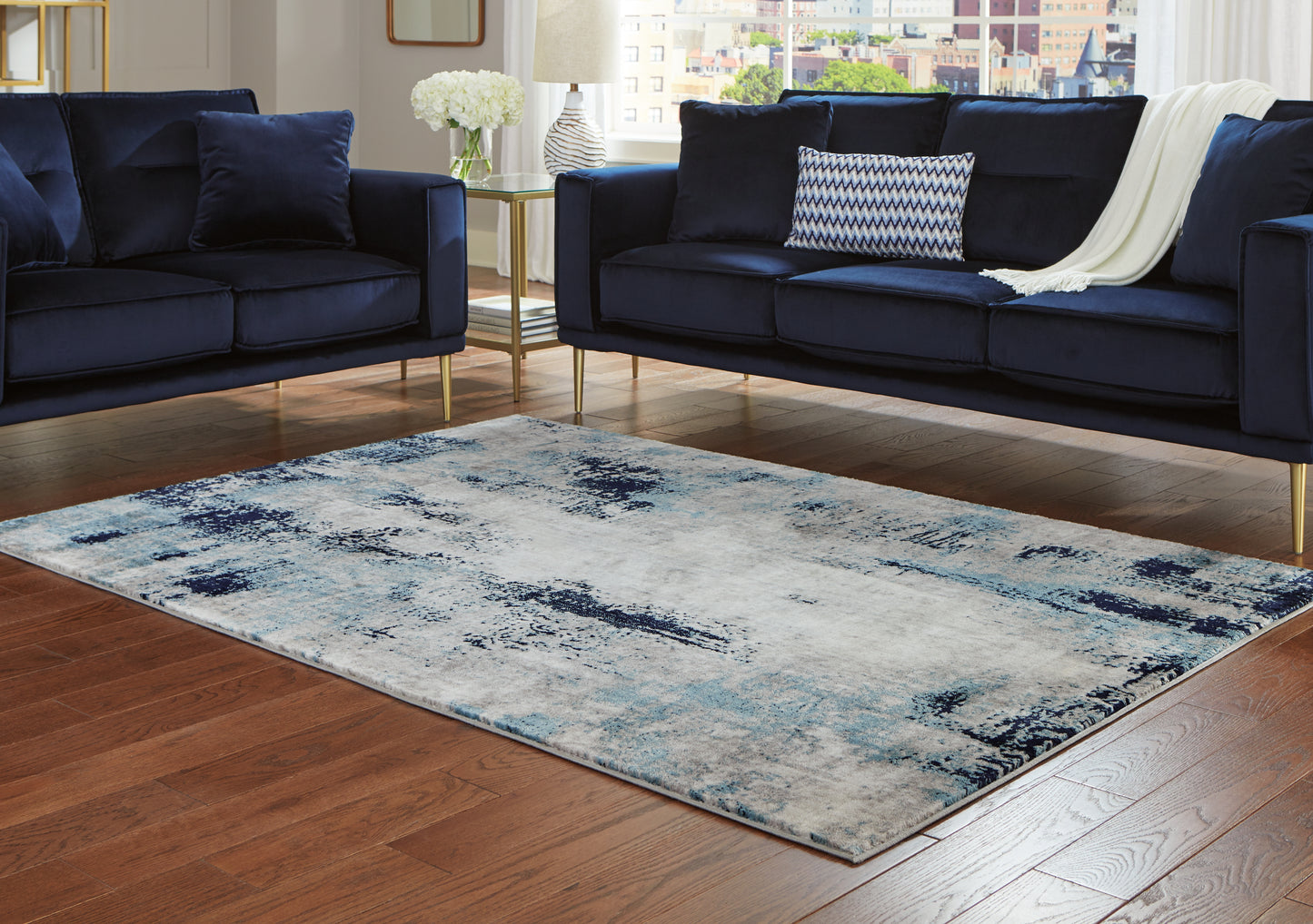 Ocala Furniture Outlet - Ashley Furniture - Leonelle Rug - 7'10" x 10' Rug / White/Blue/Gray - R404871