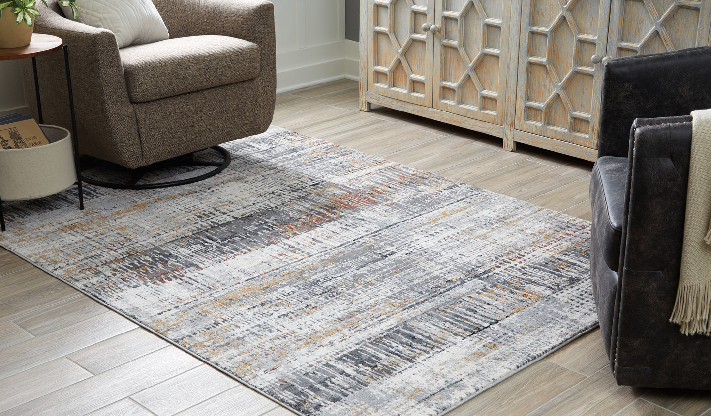Ocala Furniture Outlet - Ashley Furniture - Rhettner Rug - 5'3" x 7'3" Rug / Multi - R406072