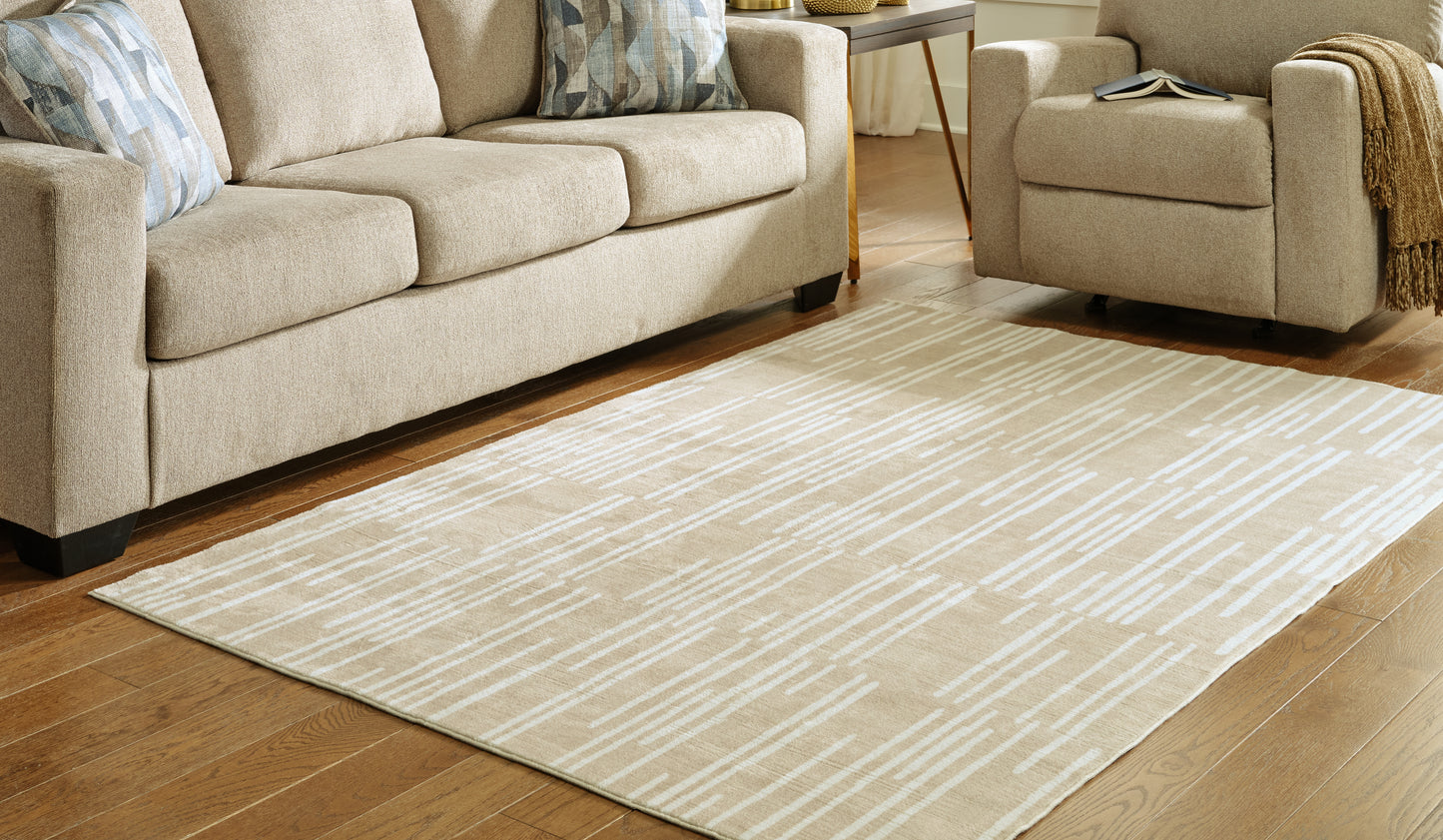 Ocala Furniture Outlet - Ashley Furniture - Ardenville Rug - 5' x 7'1" Washable Rug / Tan/Cream - R406212
