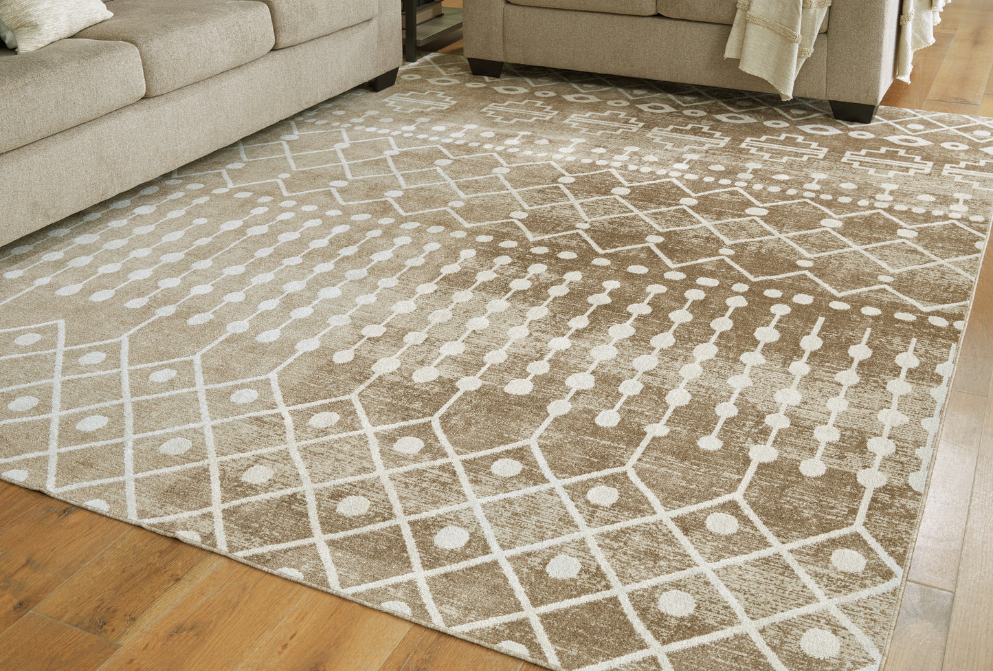 Ocala Furniture Outlet - Ashley Furniture - Bunchly Rug - 7'10" x 10'3" Washable Rug / Tan/Brown/Cream - R406221