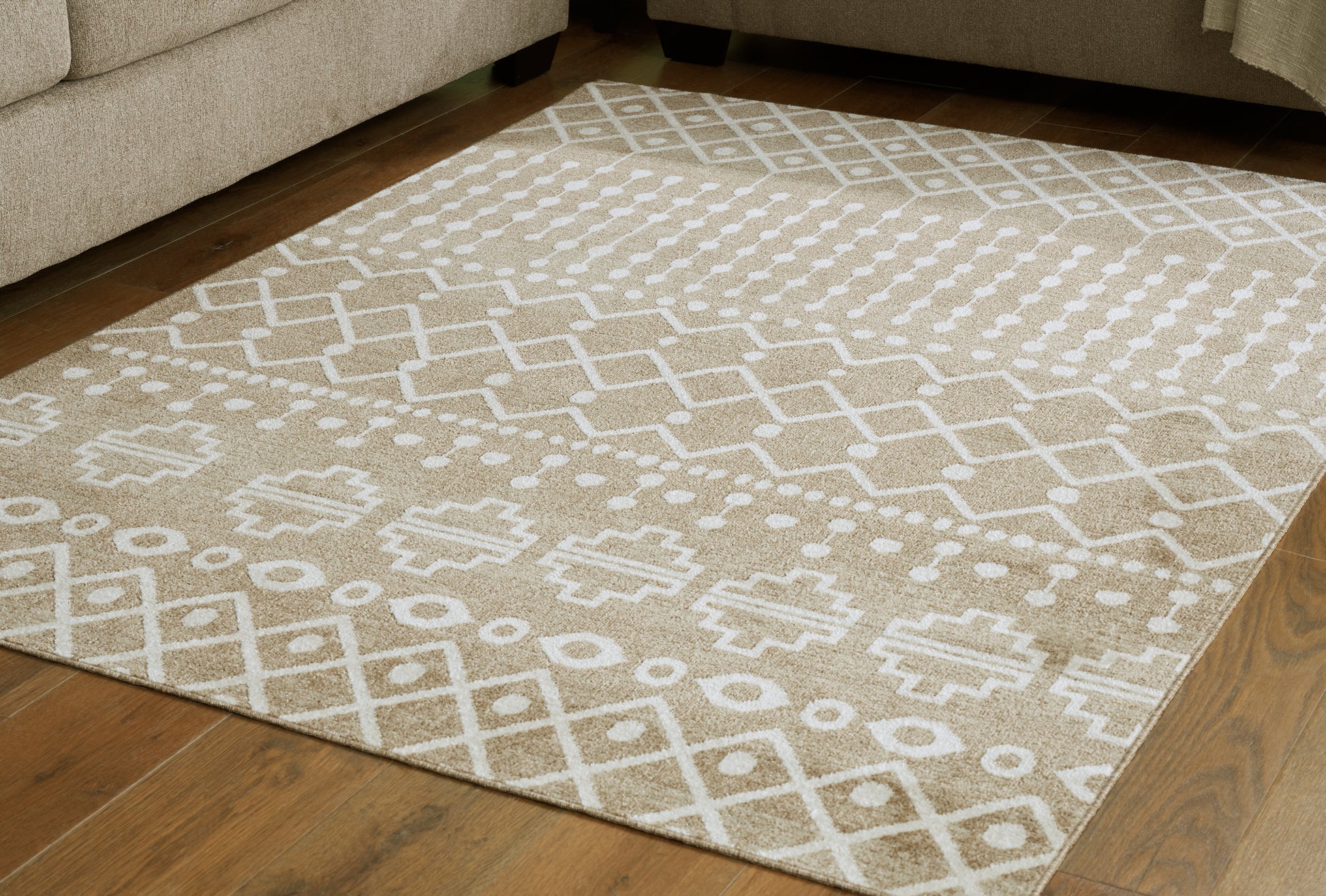Ocala Furniture Outlet - Ashley Furniture - Bunchly Rug - 7'10" x 10'3" Washable Rug / Tan/Brown/Cream - R406221