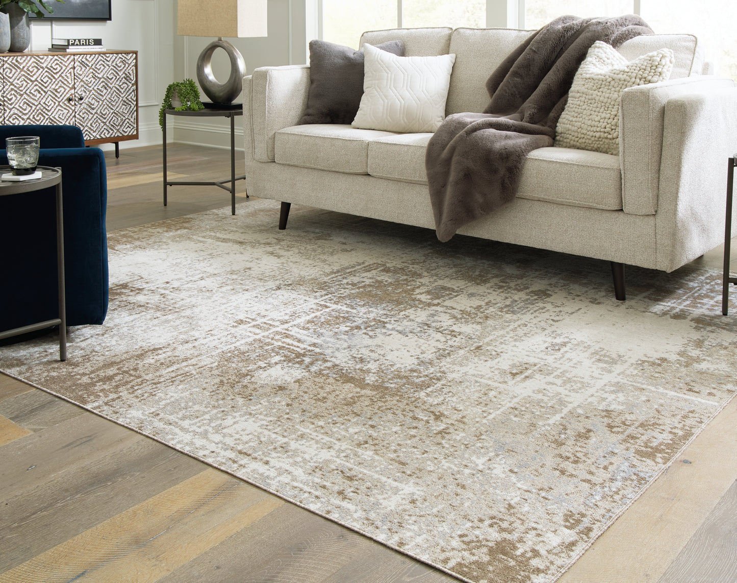 Ocala Furniture Outlet - Ashley Furniture - Grifflain Rug - 7'10" x 10'3" Washable Rug / Tan/Brown/Gray - R406231