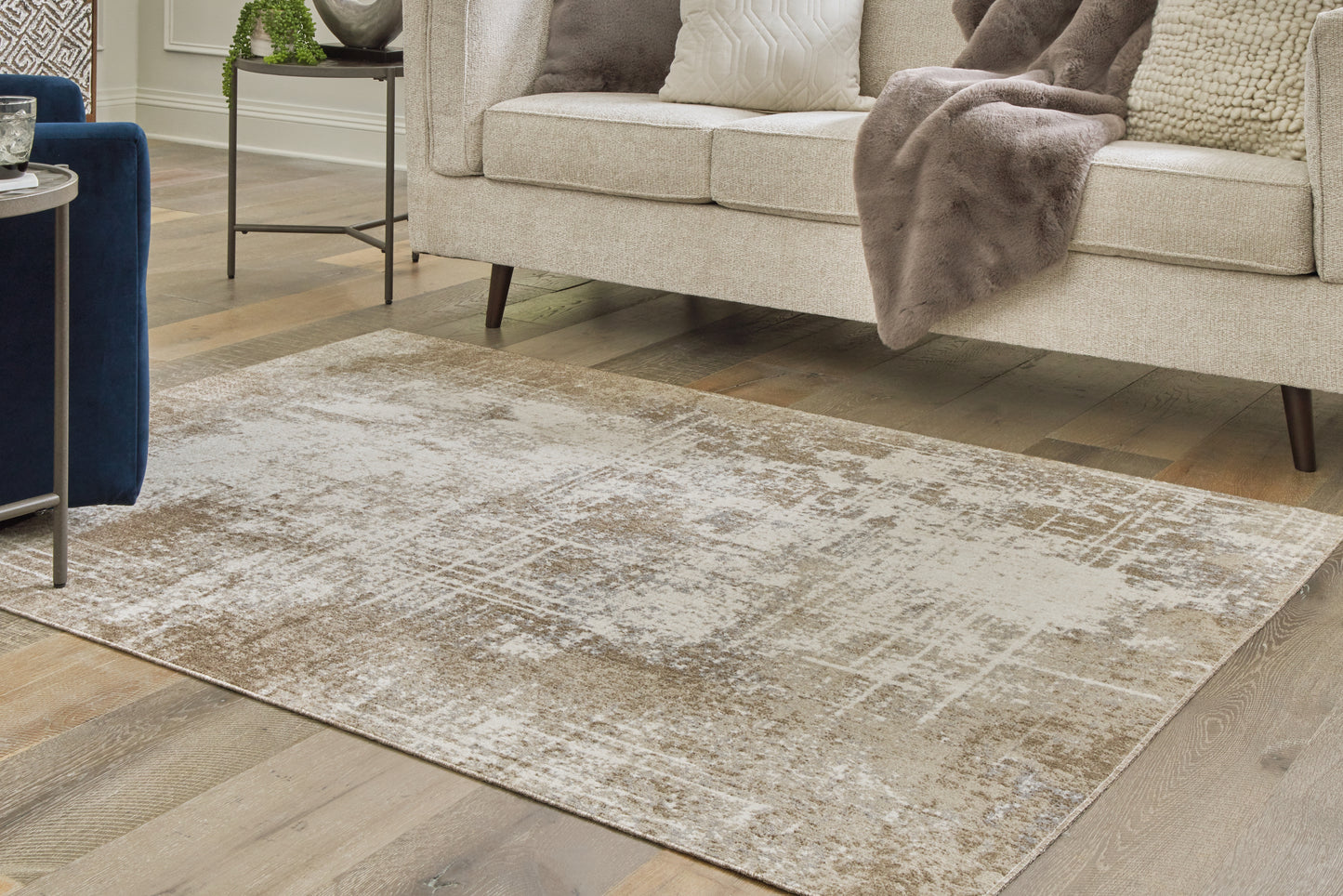 Ocala Furniture Outlet - Ashley Furniture - Grifflain Rug - 5'1" x 7' Washable Rug / Tan/Brown/Gray - R406232