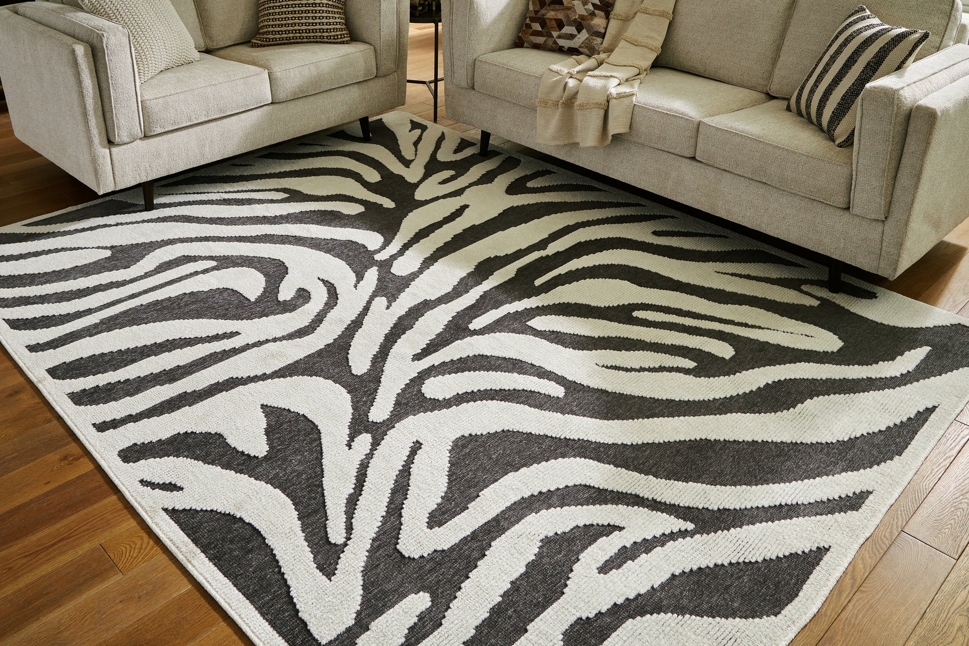 Ocala Furniture Outlet - Ashley Furniture - Thomwith Rug - 8' x 10'2" Washable Rug / Black/Ivory - R406291