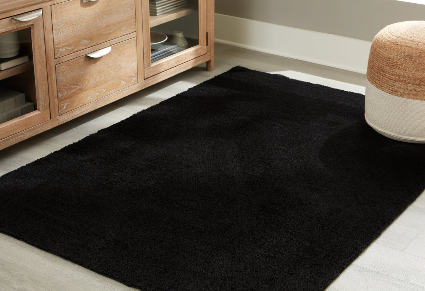 Ocala Furniture Outlet - Ashley Furniture - Anaben Rug - 5' x 7' Washable Rug / Black - R406312