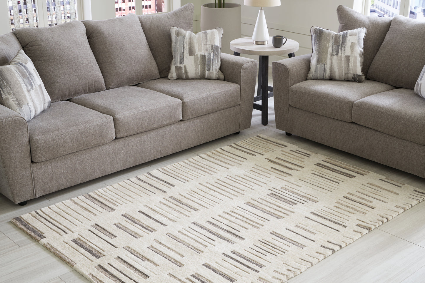 Ocala Furniture Outlet - Ashley Furniture - Leesdale Rug - 5' x 7' Rug / Ivory/Brown/Black - R406422