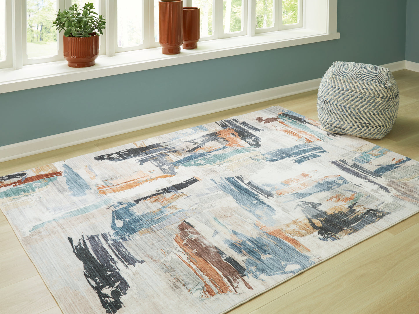 Ocala Furniture Outlet - Ashley Furniture - Hessland Rug - 8' x 10' Washable Rug / Multi - R407051