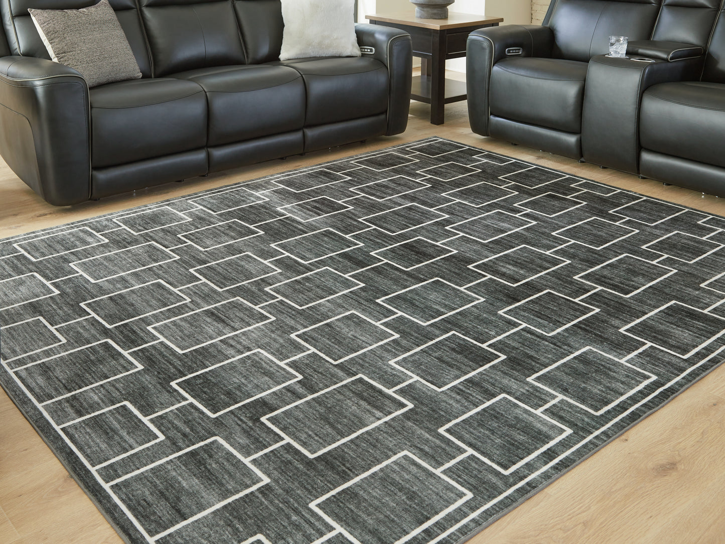 Ocala Furniture Outlet - Ashley Furniture - Elderland Rug - Washable 7'6" x 9'6" Area Rug / Black/Gray - R407401