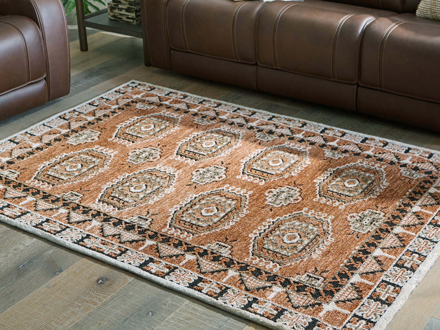 Ocala Furniture Outlet - Ashley Furniture - Qaabiz Rug - 5' x 7' Area Rug / Sienna/Ivory/Black - R407522