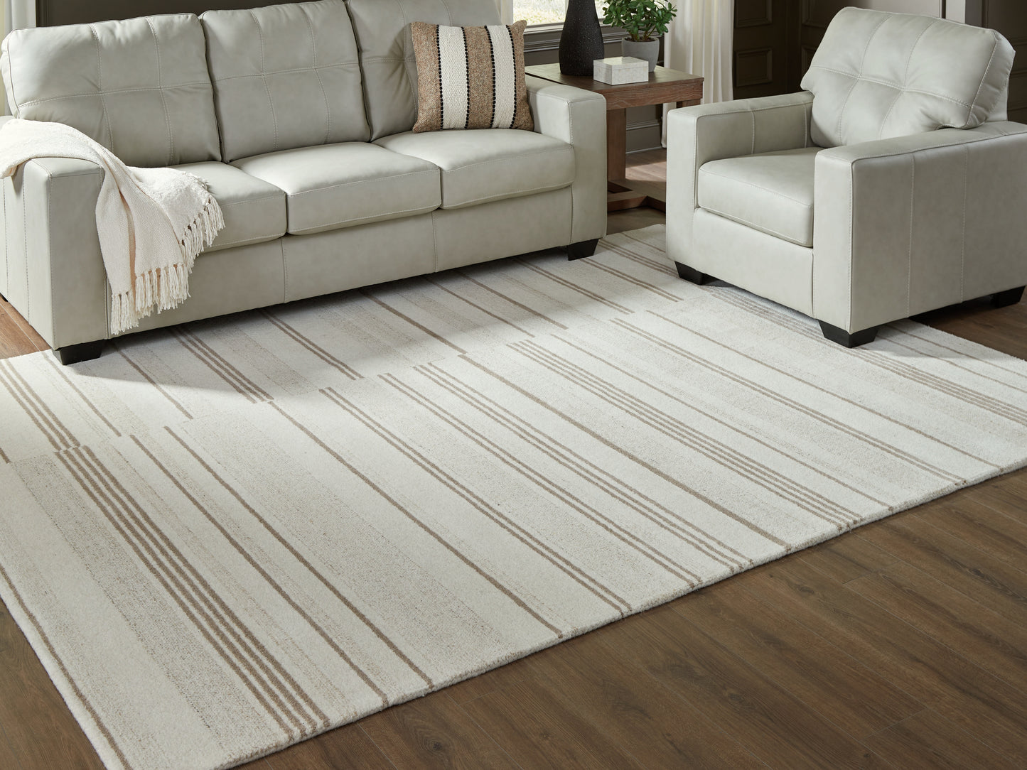 Ocala Furniture Outlet - Ashley Furniture - Gadence Rug - 7'8" x 10' Area Rug / Ivory/Tan - R407641
