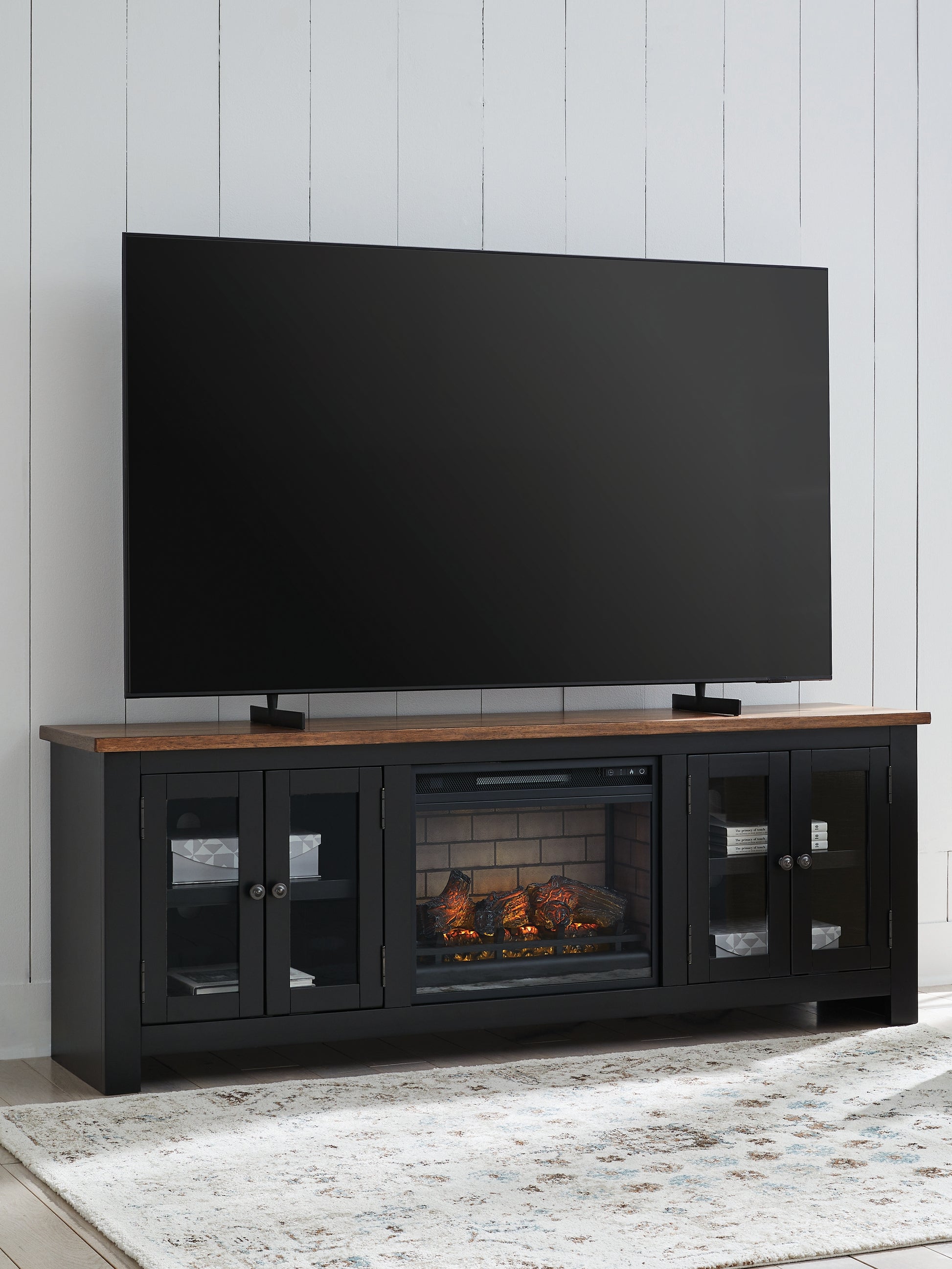Ocala Furniture Outlet - Ashley Furniture - Wildenauer 76" TV Stand with Electric Fireplace - 76" TV Stand with Electric Fireplace / Brown/Black - W664W1