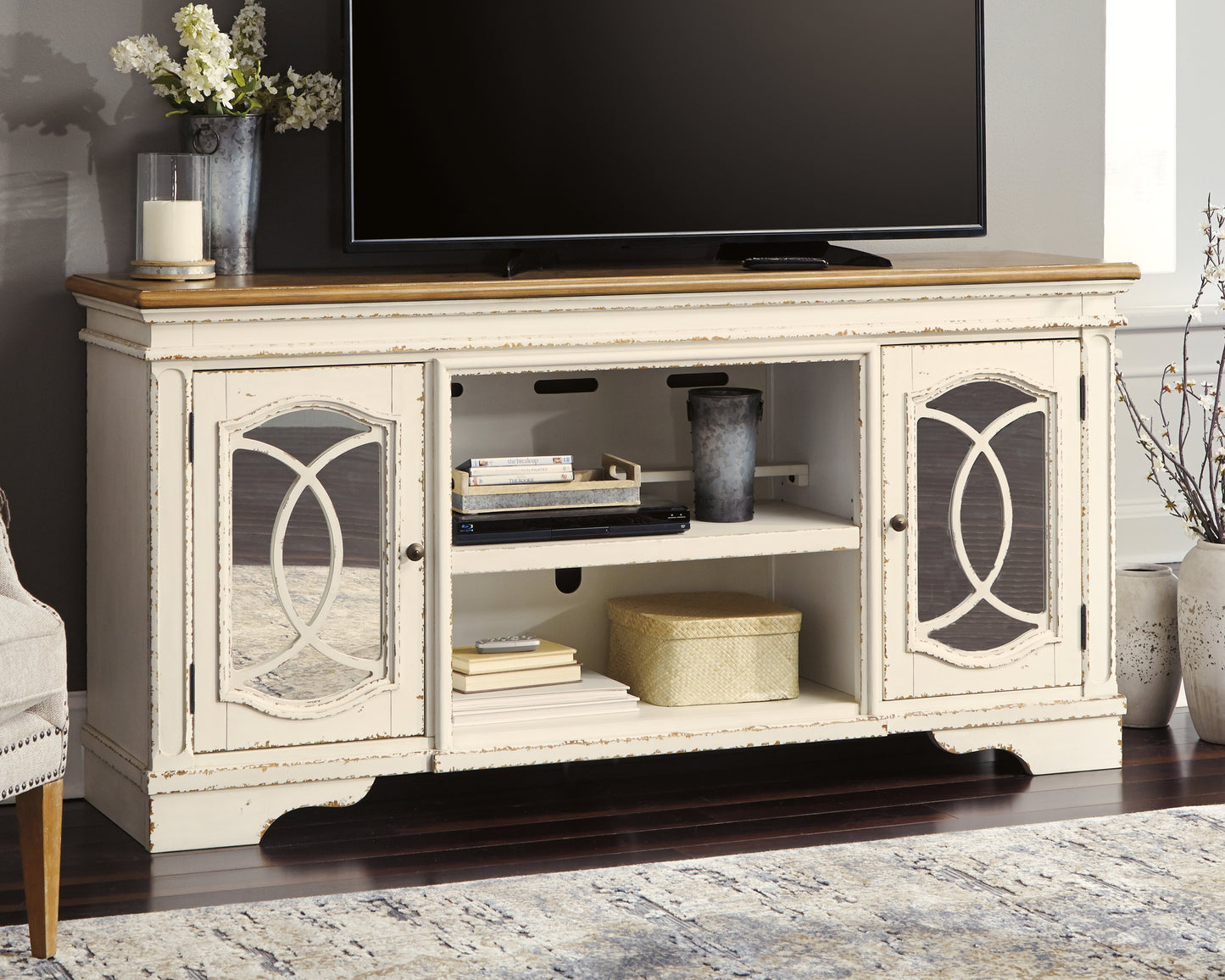 Ocala Furniture Outlet - Ashley Furniture - Realyn 74" TV Stand - 74" / Chipped White - W743-68