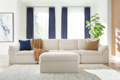 Ocala Furniture Outlet - Ashley Furniture - Fannin Sectional - RAF 4-Piece Sectional with Ottoman / Ivory - PC84304S1