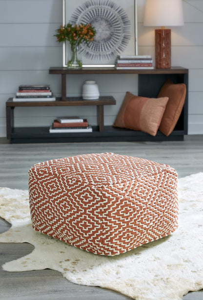 Ocala Furniture Outlet - Ashley Furniture - Brynnsen Pouf - Pouf / Rust/Ivory - A1001056