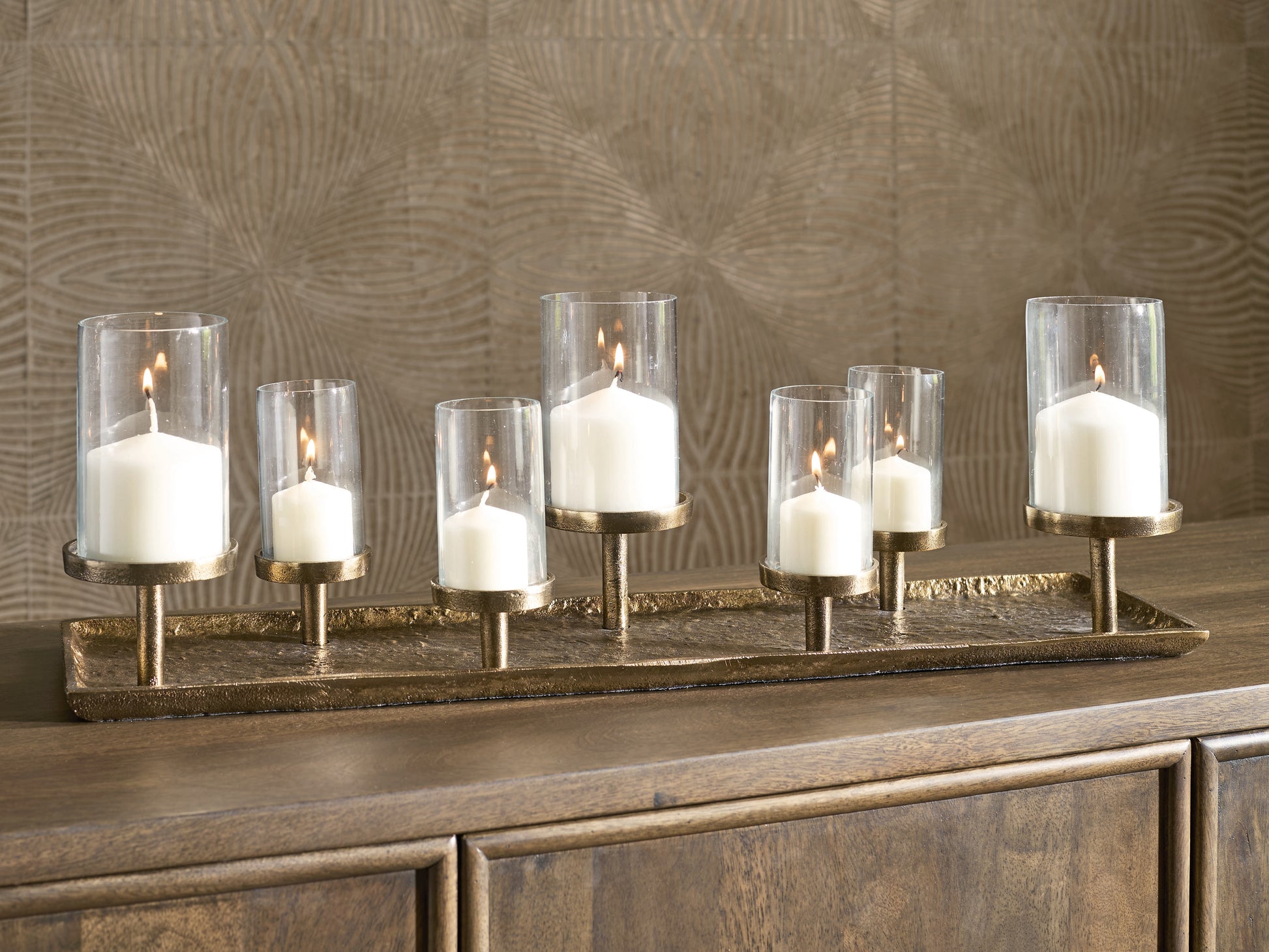 Ocala Furniture Outlet - Ashley Furniture - Wallmond Candle Holder - Candle Holder / Antique Brass Finish - A2000820