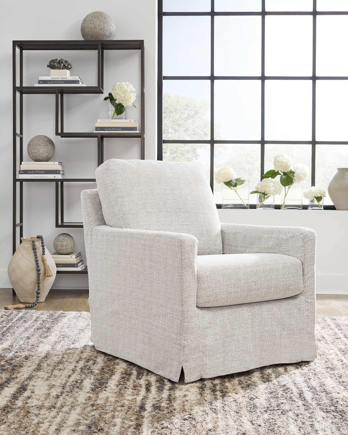 Ocala Furniture Outlet - Ashley Furniture - Nenana Next-Gen Nuvella Swivel Glider Accent Chair - Swivel Glider Accent Chair / Stone - A3000644