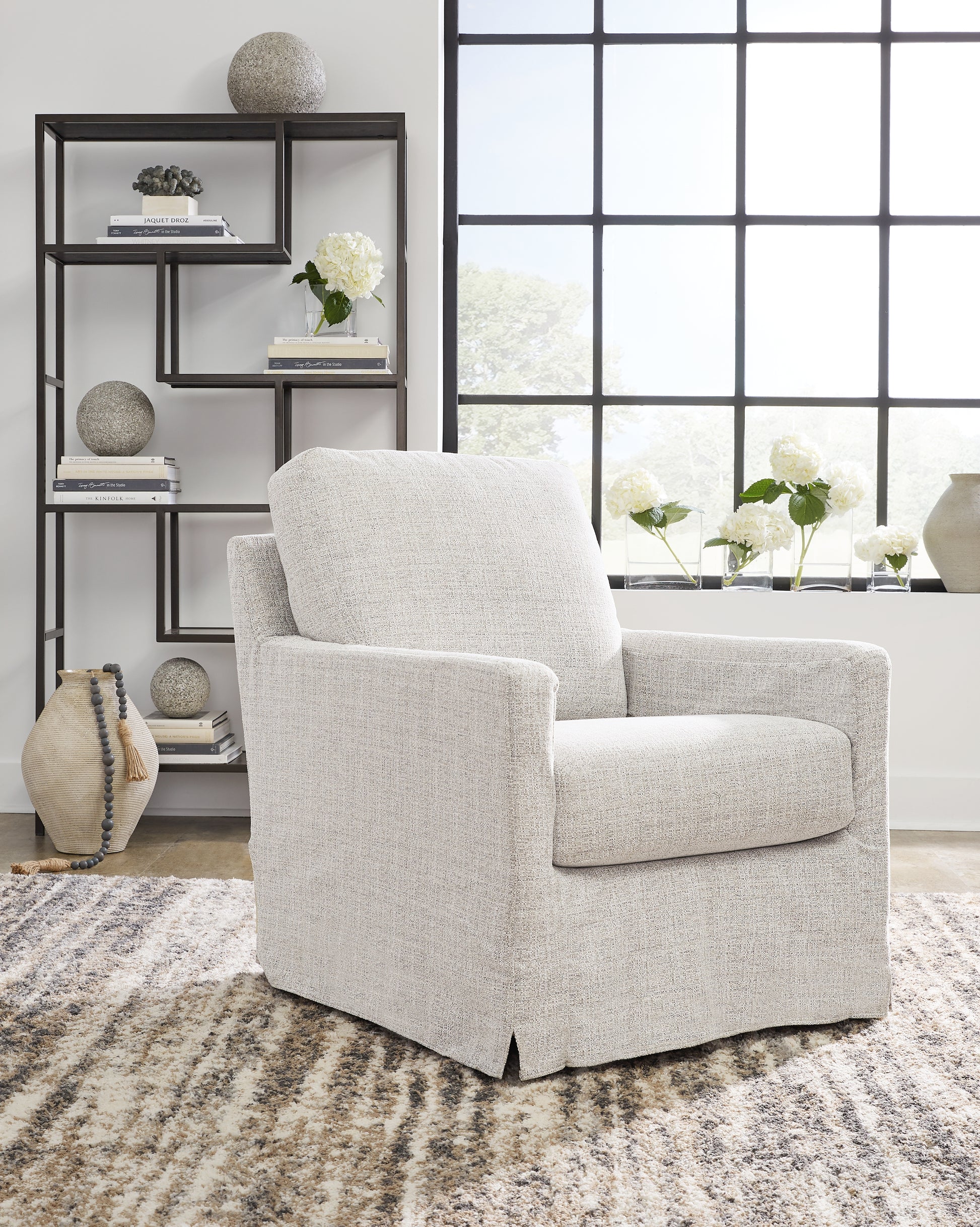 Ocala Furniture Outlet - Ashley Furniture - Nenana Next-Gen Nuvella Swivel Glider Accent Chair - Swivel Glider Accent Chair / Stone - A3000644