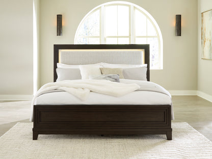 Ocala Furniture Outlet - Ashley Furniture - Neymorton Bedroom - California King Upholstered Panel Bed / Dark Grayish Brown - B618B5