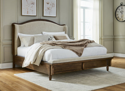 Ocala Furniture Outlet - Ashley Furniture - Sturlayne Bedroom - California King Upholstered Panel Bed / Brown - B787B5