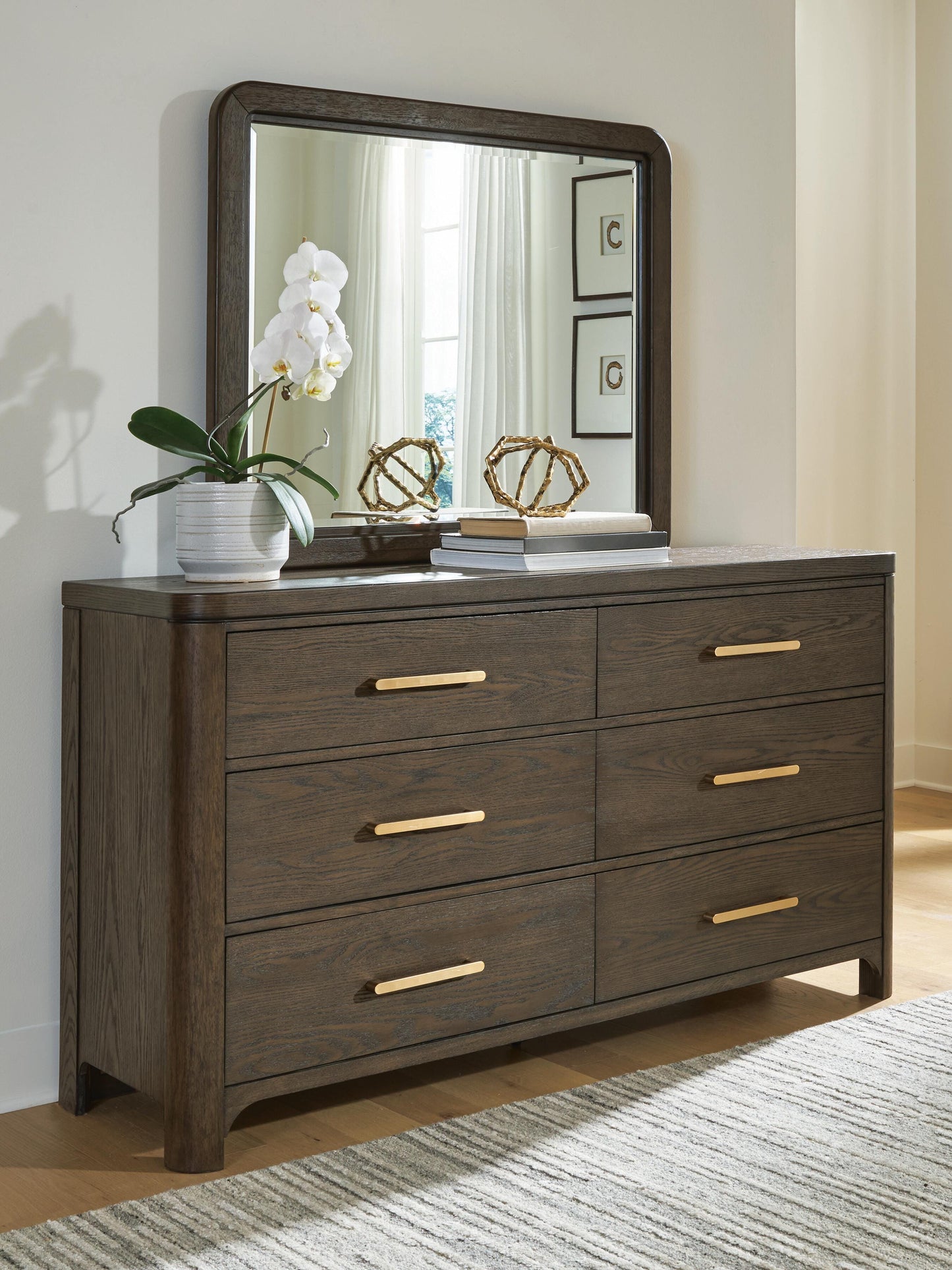 Ocala Furniture Outlet - Ashley Furniture - Radkin Bedroom - Dresser and Mirror / Burnished Brown - PCB843B1