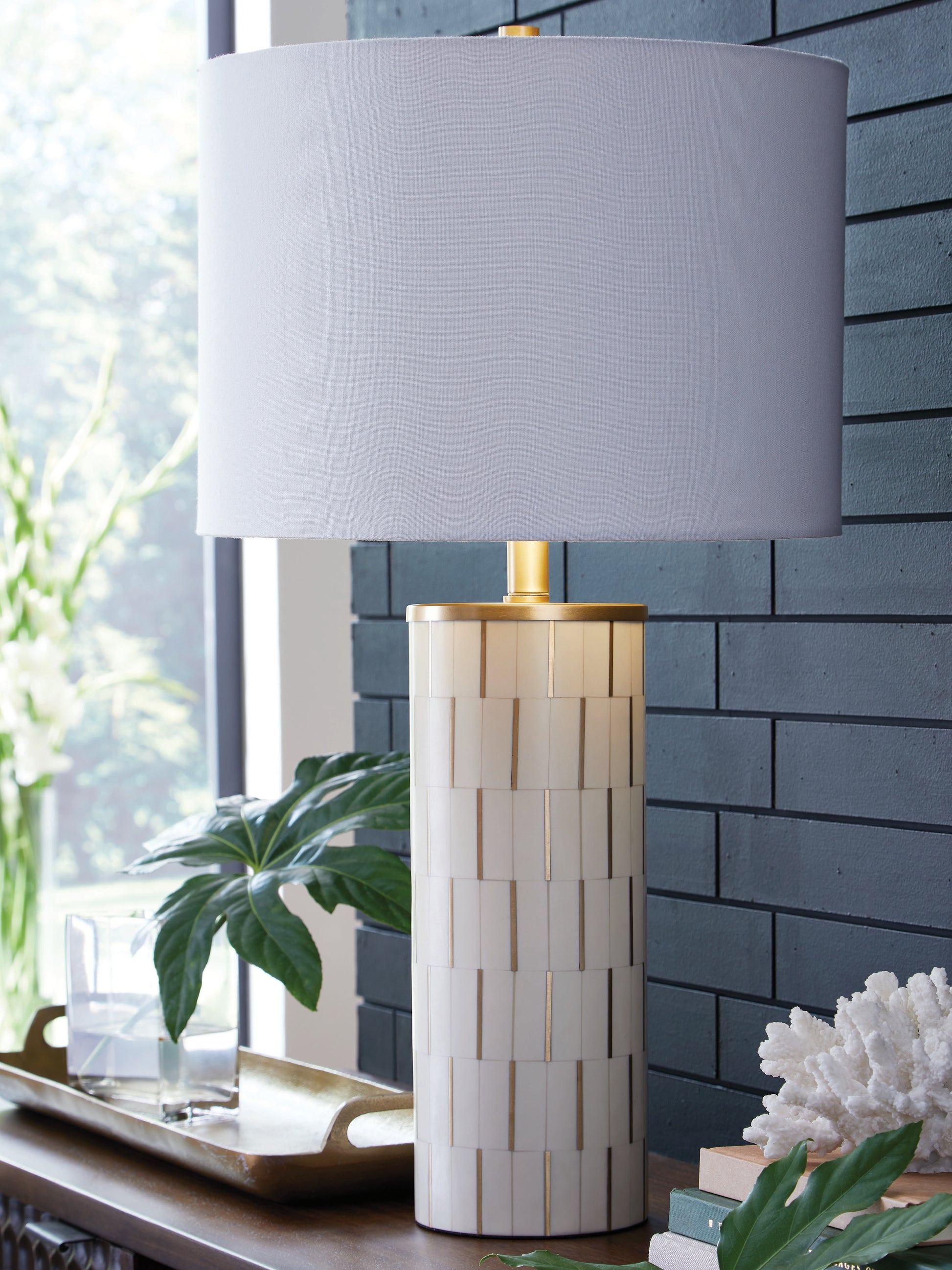 Ocala Furniture Outlet - Ashley Furniture - Faridworth Lighting - Poly Table Lamp (1/CN) / White/Gold Finish - L235954