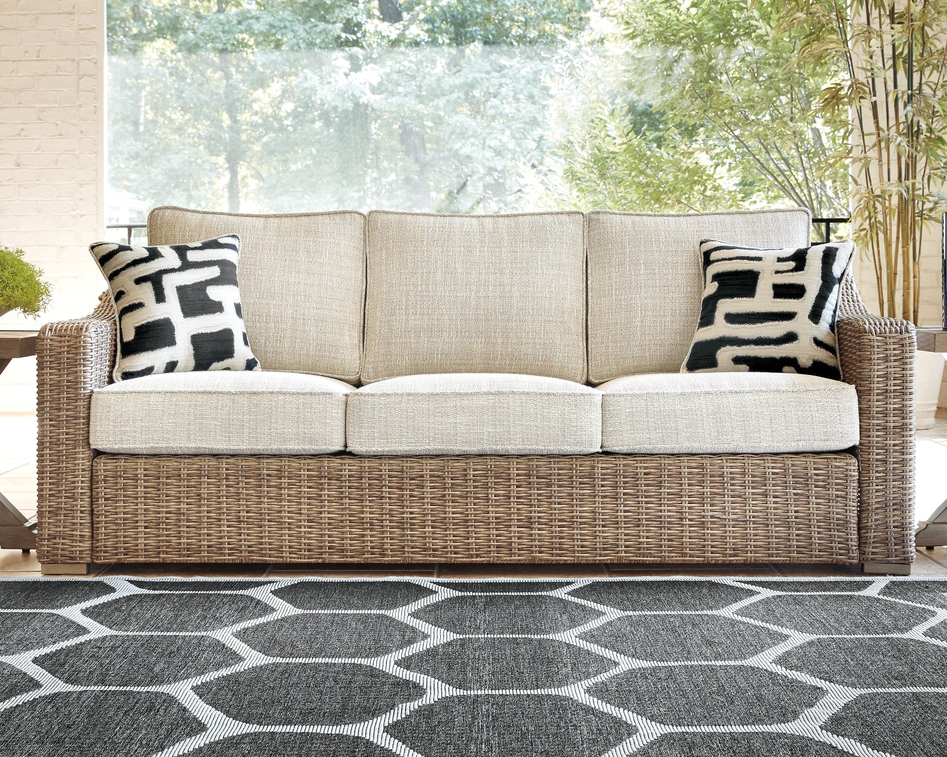 Ocala Furniture Outlet - Ashley Furniture - Beachcroft Outdoor - Sofa with Cushion / Beige - P791-838