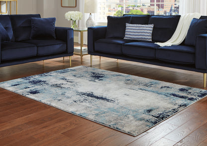 Ocala Furniture Outlet - Ashley Furniture - Leonelle Rug - 7'10" x 10' Rug / White/Blue/Gray - R404871