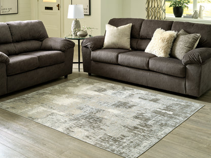 Ocala Furniture Outlet - Ashley Furniture - Arriston Rug - 5'3" x 7' Washable Rug / Multi - R405562
