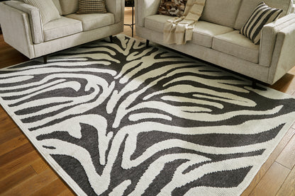 Ocala Furniture Outlet - Ashley Furniture - Thomwith Rug - 8' x 10'2" Washable Rug / Black/Ivory - R406291