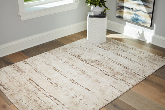 Ocala Furniture Outlet - Ashley Furniture - Kasney Rug - 5' x 7' Rug / Cream/Brown - R406852