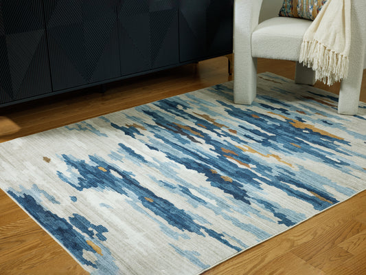 Ocala Furniture Outlet - Ashley Furniture - Vinlett Rug - 5' x 7' Washable Rug / Cream/Blue/Brown - R407042