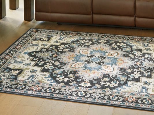 Ocala Furniture Outlet - Ashley Furniture - Leningston Rug - 8' x 10' Washable Rug / Black/Cream/Blue - R407061