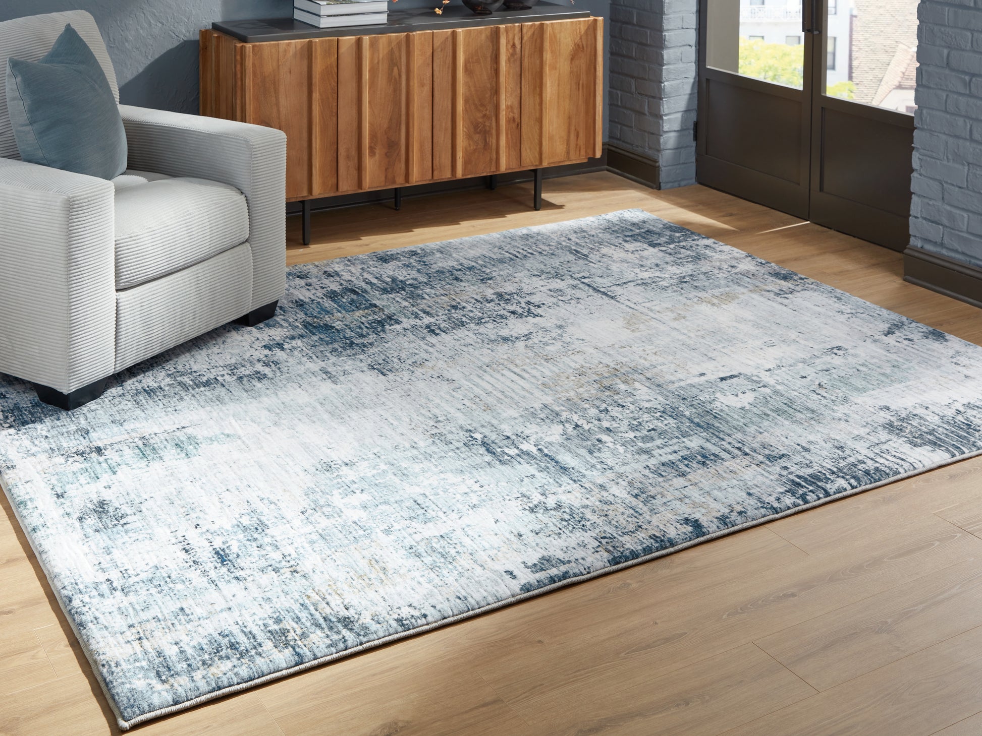 Ocala Furniture Outlet - Ashley Furniture - Arlenmont Rug - 5' x 7' Area Rug / Blue/White/Brown - R407482