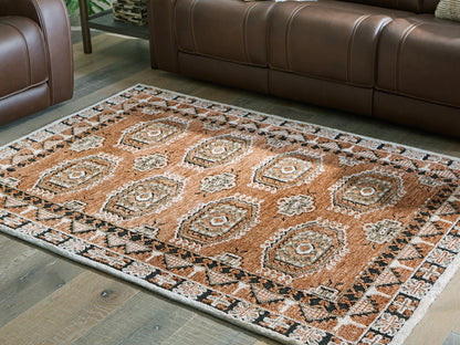 Ocala Furniture Outlet - Ashley Furniture - Qaabiz Rug - 5' x 7' Area Rug / Sienna/Ivory/Black - R407522