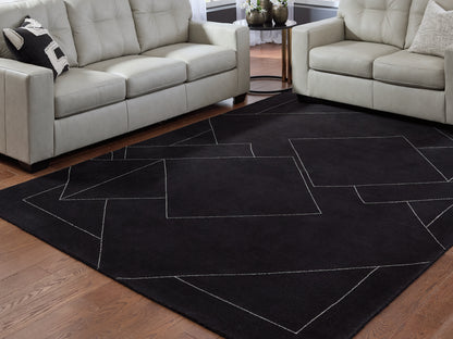 Ocala Furniture Outlet - Ashley Furniture - Marav Rug - 5' x 7' Area Rug / Black/White - R407532