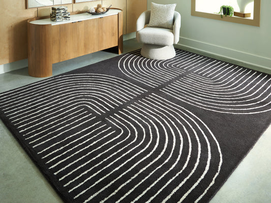 Ocala Furniture Outlet - Ashley Furniture - Eldonmore Rug - 7'8" x 10' Area Rug / Black/Ivory - R407571