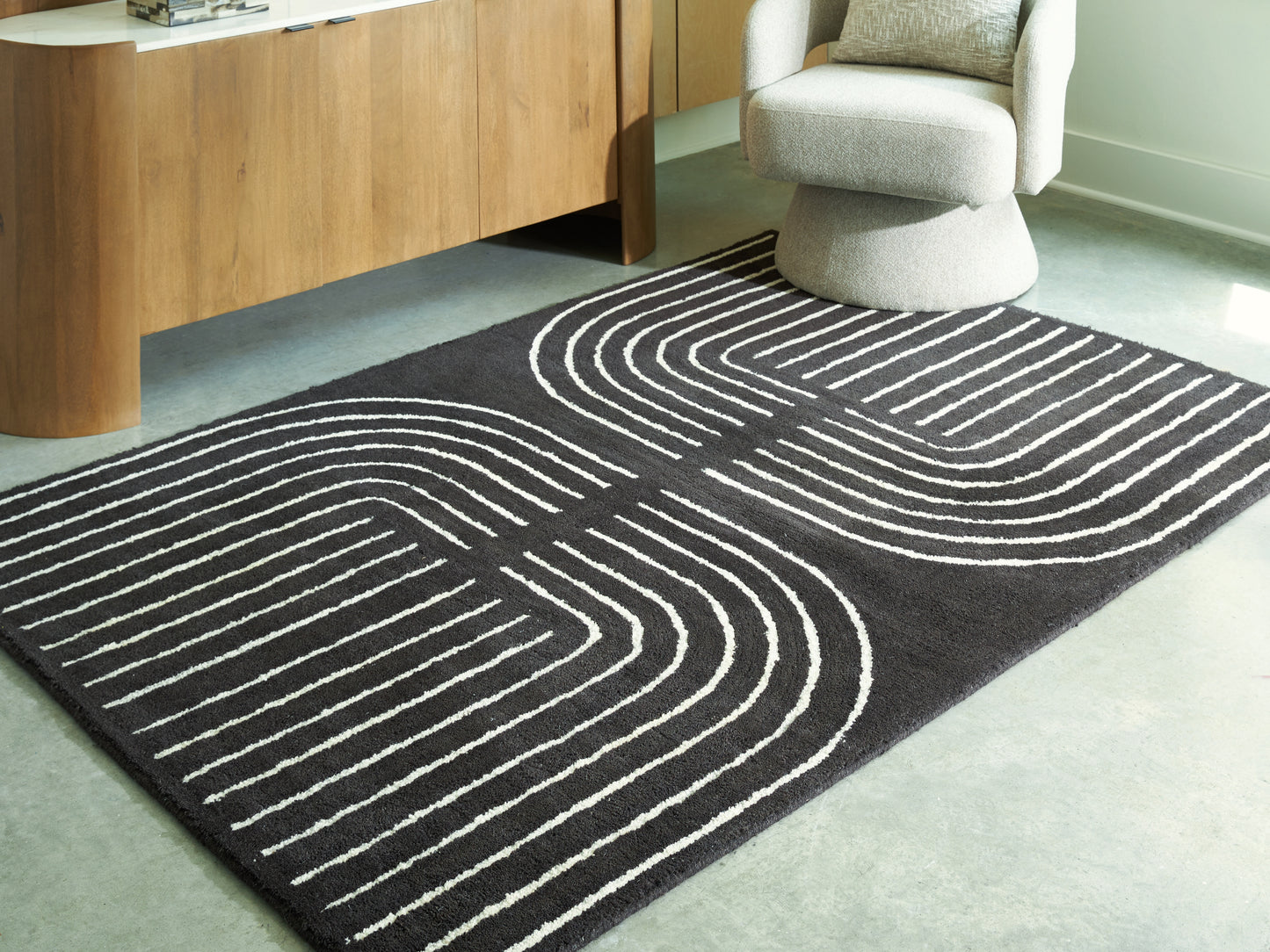 Ocala Furniture Outlet - Ashley Furniture - Eldonmore Rug - 5' x 7' Area Rug / Black/Ivory - R407572