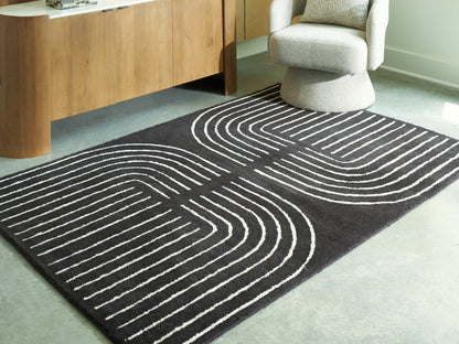 Ocala Furniture Outlet - Ashley Furniture - Eldonmore Rug - 5' x 7' Area Rug / Black/Ivory - R407572
