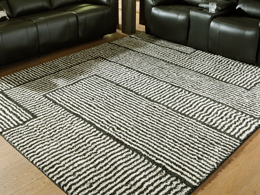 Ocala Furniture Outlet - Ashley Furniture - Kurtmen Rug - 5' x 7' Area Rug / Black/Ivory - R407592