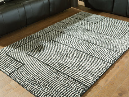 Ocala Furniture Outlet - Ashley Furniture - Kurtmen Rug - 5' x 7' Area Rug / Black/Ivory - R407592