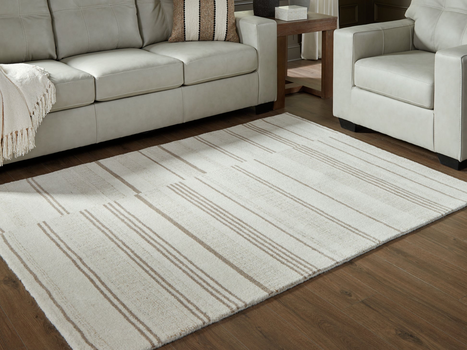 Ocala Furniture Outlet - Ashley Furniture - Gadence Rug - 5' x 7' Area Rug / Ivory/Tan - R407642